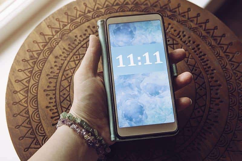 meaning behind repeating numbers, 11, 11 11, mobile phone with 11 11
