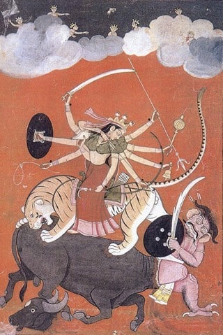 Goddess Durga going into battle riding a tiger