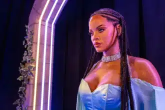 rihanna pisces energy shown with watery silver tones and a fading silhouette